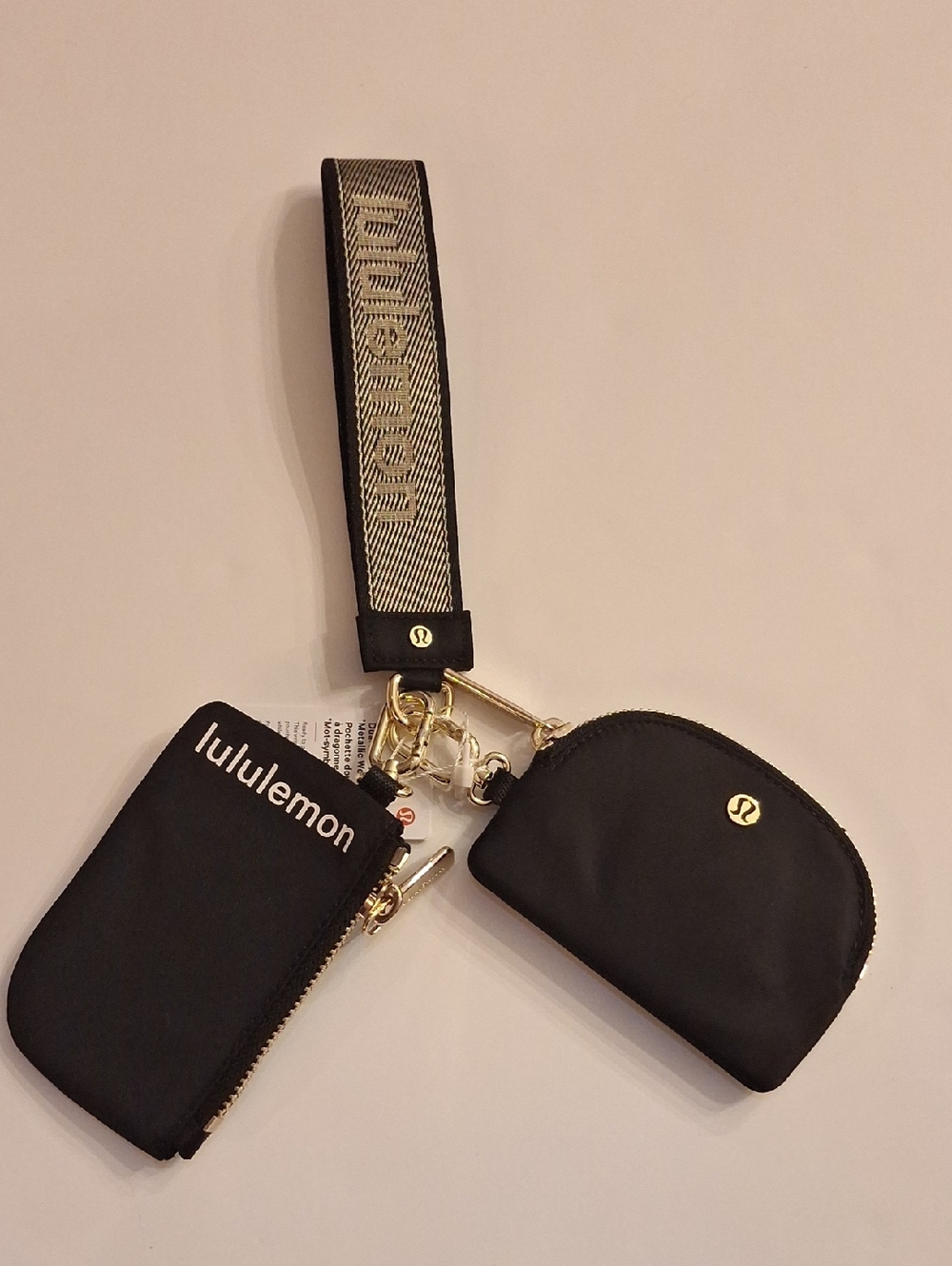NWT Lululemon Dual Pouch Wristlet Wordmark Blk/gold